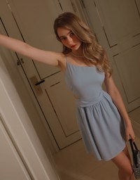 Beveled Hollow Side Ruched Mini Dress
