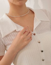 Sheer Knit Cropped Shirt with Heart Buttons and Lapel Collar