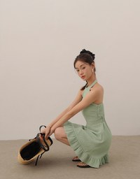 Textured Sleeveless Halter Padded Mini Dress with Ruffled Hem