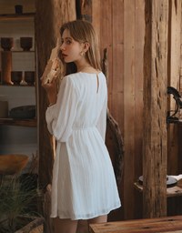 Soigné Feather Trim Buttoned Mini Dress