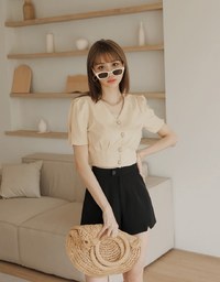 Soigné Pleated Buttoned Crop Top