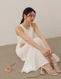 Elegant Halter Neck Pleated Padded Maxi Dress with Side Slit and Flowy Hem
